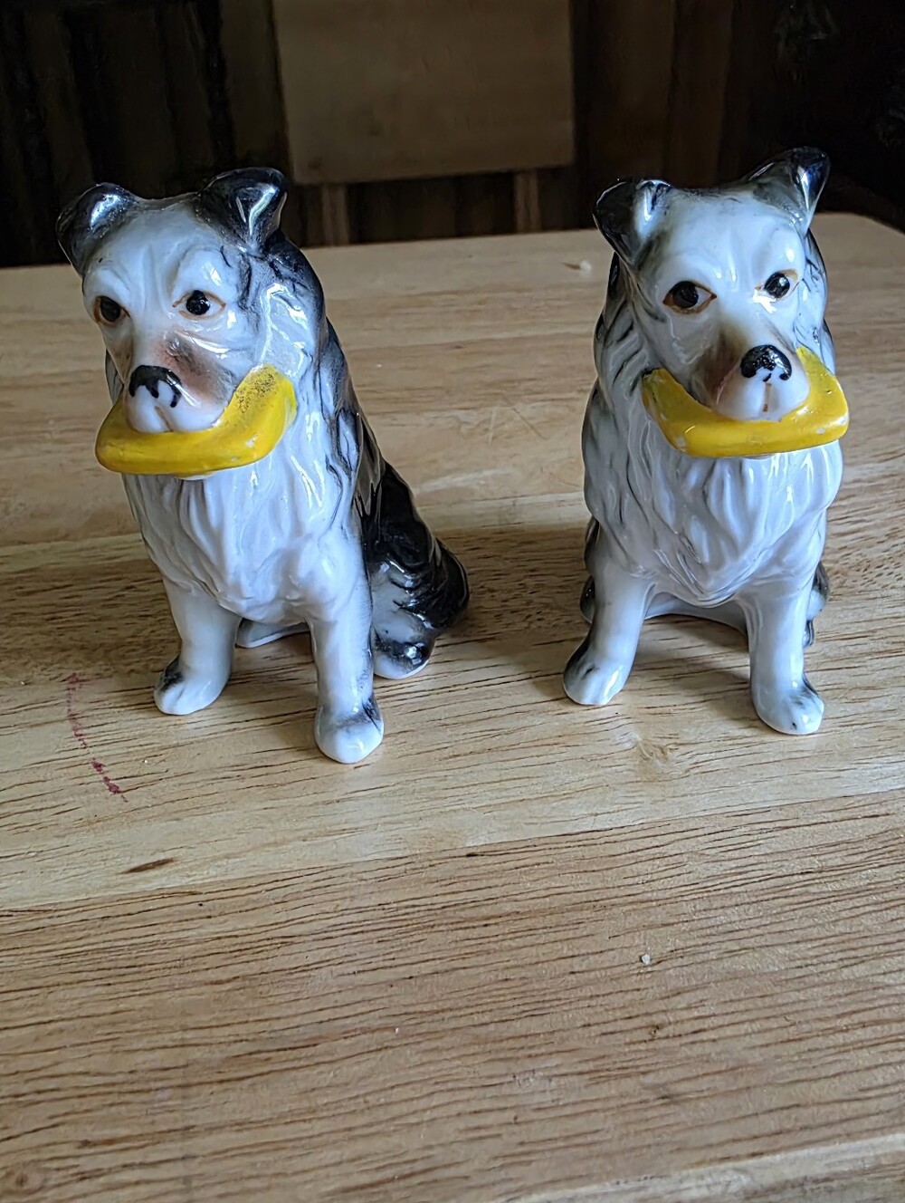 Ceramic Dog Figurine Set in White and Black with Yellow Accessory